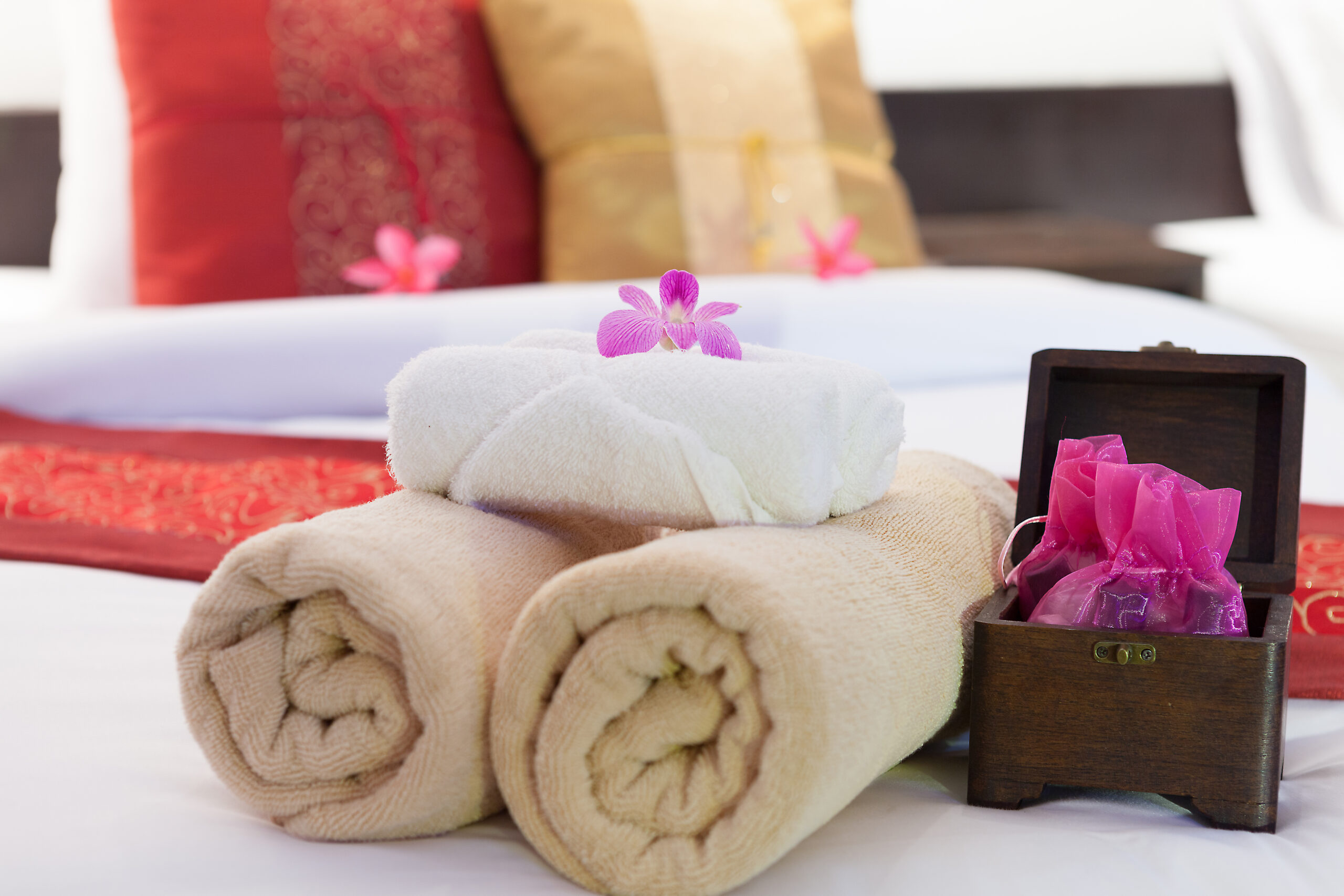 Bedroom ready for guests in soft warm lighting
